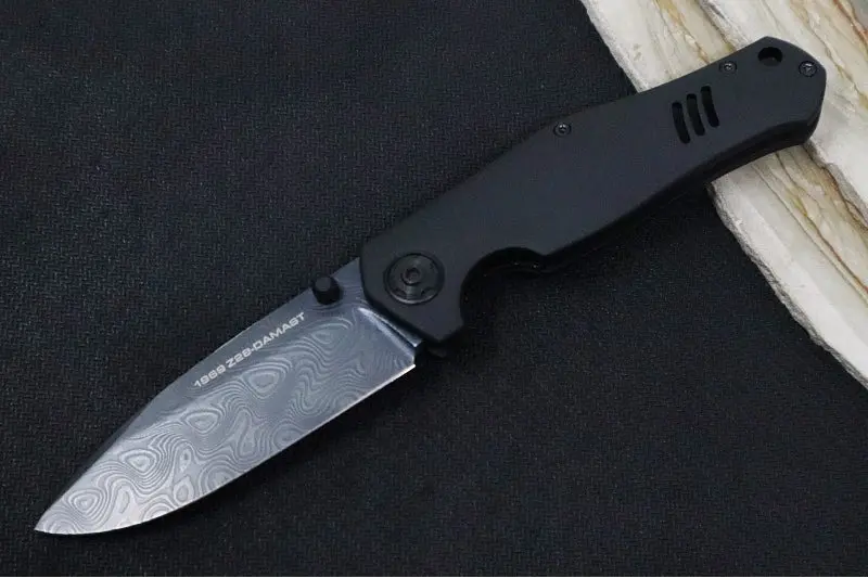 Boker 1969 Z28 Damascus Shadow 111110Dam – Drop Point Damascus Blade (Chad Nichols Tread Pattern), Pvd Coating, Black Anodized Handle 1